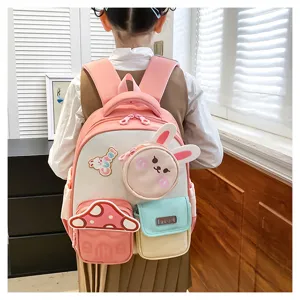 Sac à dos mini lapin de dessin animé mignon pour enfants de jardin d'enfants, détails roses.