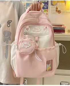 Süßer rosa-weißer Schulrucksack mit transparentem Sichtfenster und Mini-Tasche Detail.
