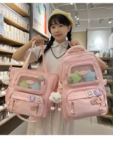 Rosa süßer Schulrucksack und Tragetaschen Set mit Sichtfenster und süßen Pins für Mädchen.