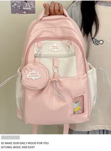 Detailaufnahme des rosa Mini-Rucksacks im süßen Stil mit Münztasche und süßem Plüschanhänger.