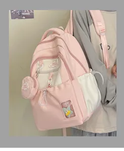 Rosa süßer kleiner Rucksack für Damen, Canvas Schultasche mit mehreren Taschen und Minitäschchen.