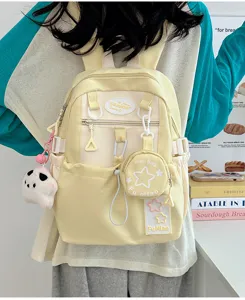 Zaino giapponese carino con design a stella, mini borsetta e ciondolo in peluche per ragazze.