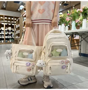 Niedlicher beiger Canvas Ita Rucksack und Tote Set mit klarem Fach und Plueschwolke.