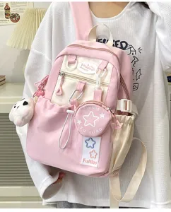 Zaino rosa carino in stile giapponese per ragazze, dettaglio con motivo a stelle casual.