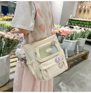 Süßer Canvas-Itaschen-Rucksack mit klarem Sichtfenster für süßen Alltagsstil und Dekoration.
