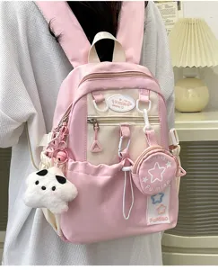 Zaino rosa carino con motivo a stelle, ciondolo di peluche grazioso e piccolo portamonete.