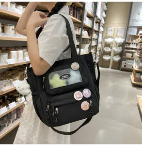 Lässiger schwarzer Canvas-Rucksack mit transparenter Tasche für den täglichen Gebrauch.