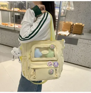 Gelbe Canvas-Ita-Tasche mit Sichtfenster, süßer Rucksack und Umhängetasche für Schüler.
