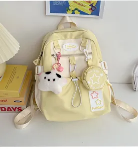 Zaino giallo in stile giapponese carino con ciondolo a stella, borsa scolastica casual per ragazze.