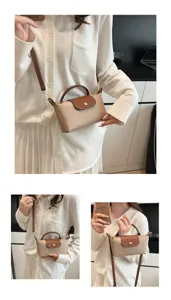 Kleine Dummytasche Umhängetasche mit Griff und brauner Lederklappe für Damen Alltag.