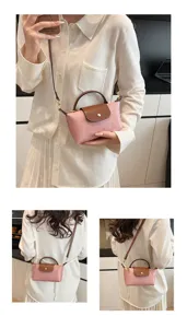 Schicke Mini-Knödel-Tasche für Damen, vielseitige Umhängetasche mit Griff und Überschlag.