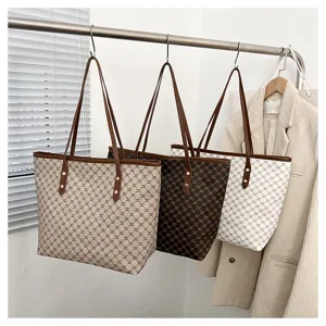 Large capacity women tote bag classic vintage monogram shoulder commuter bag for daily use.