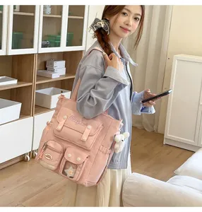 Niedlicher rosa Canvas Rucksack für Schüler, großer lässiger Tagesrucksack mit Taschen.