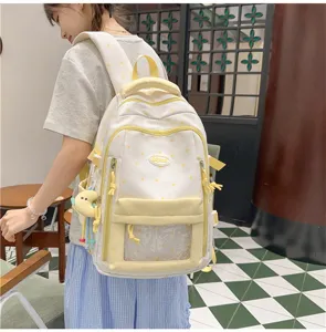 Süßer Sternen-Schulrucksack aus Leinen mit transparenter Fronttasche und Anhängern für den Alltag.