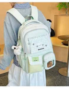 Koreanischer College-Stil süßer Rucksack mit Katzenmuster und Bärenanhänger für Schüler.