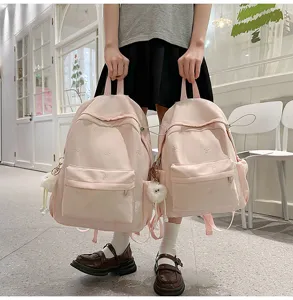 Süßer Bonbonfarbener Schleifen Rucksack für Mädchen, leicht und niedlich rosafarbener Schultag