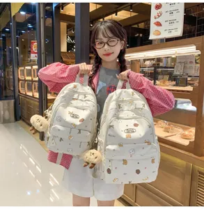 Süßer Cartoon Druck Mini Rucksack für Mädchen, modische Canvas Schultasche mit Anhängern.