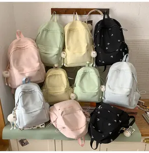 Süßer bonbonfarbener Schleifen-Detail-Rucksack, leichte Freizeitschule für Studenten.