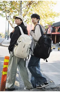 Zaino casual monocolore leggero per studenti e coppie, elegante borsa da scuola per viaggi.