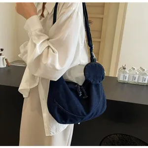 Korean style denim dumpling crossbody bag for women, lightweight winter casual soft shoulder bag.