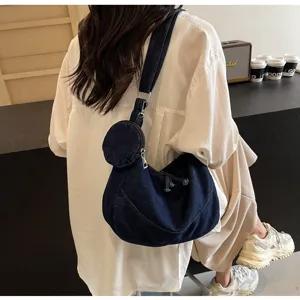 Stylish denim dumpling crossbody bag, lightweight soft shoulder bag with small pouch for winter.