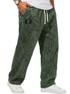 Men green casual trousers detail, textured fabric, drawstring waist, pocket label design.