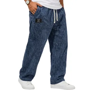 Men's loose linen casual pants solid color comfortable trousers with drawstring and pocket label.