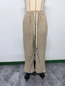 Corduroy straight leg casual pants detail view, showing soft textured fabric and elastic drawstring waist.