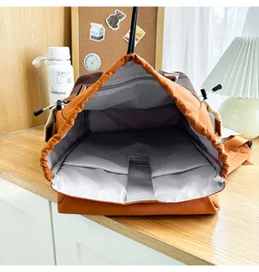 Detail view of the casual outdoor backpack interior, showing spacious laptop compartment and design.