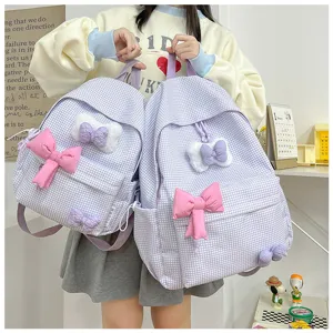 Schöner karierter Schulrucksack für Mädchen, leichter Rucksack mit süßer Schleife in Lila.