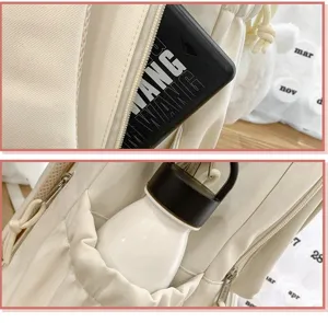 Nahaufnahme der beigen Canvas Rucksack Mehrschicht Tasche und Seitenflaschenhalter.