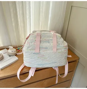 Süßer weißer Rucksack im Ins-Stil mit rosa Trägern und Fächern für den Schulalltag.
