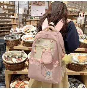Rosa süßer Campus-Rucksack mit kontrastfarbenem Patchwork und kleiner Münztasche für Schüler.