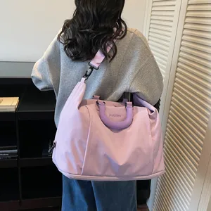 Grand sac de voyage de grande capacité pour femme, sac de sport imperméable léger.