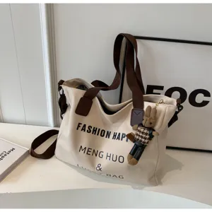 Segeltuch Shopper Tasche grosse Kapazitaet Damen Umhaengetasche mit niedlichen Plueschanhaenger.
