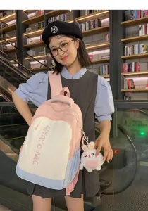 Frischer, farbblockierter Mini-Rucksack mit niedlichem Hasen-Anhänger, lässige Schultasche für Frauen.