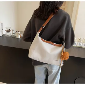 Lässige Damen Umhängetasche aus Canvas, große Kapazität Schultertasche für Pendeln Alltag.