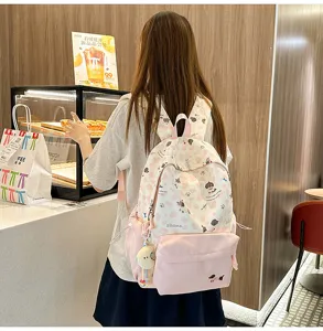 Süßer rosa Hündchen Druck Rucksack für Schule, lässiges Reisen und den Alltag.