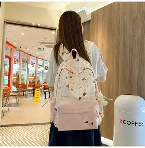 Süßer japanischer Schulrucksack für Teenager-Mädchen, süßer rosa-weißer niedlicher Hundemotiv-Schulranzen.