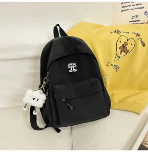 Schwarzer lässiger Schulrucksack für Schüler, große Kapazität Tagesrucksack mit Plüschanhänger.