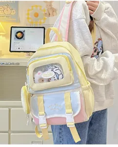 Süßer pastellfarbener Kontrast-Schulrucksack mit klarem Frontfenster für Pins und kleine Spielzeuge.