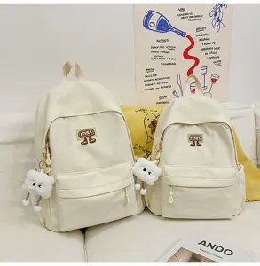 Beige Canvas Schulrucksack Set für Schüler, großer lässiger Daypack mit Plüschanhänger.