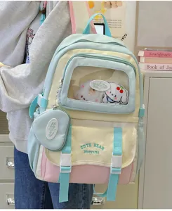 Süßer pastellfarbener Rucksack mit transparenter Ita-Bag-Tasche und Bärenstickerei für Kinder.