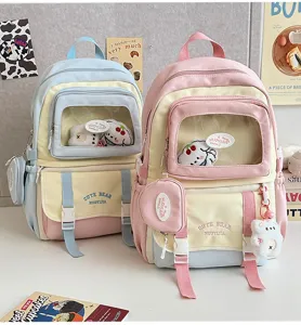 Süßer farbblockierter Schulrucksack mit transparenter Vordertasche für Kinder und Schüler.