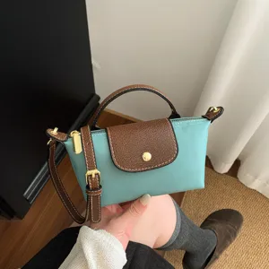 Mini Umhängetasche mit Griff, modische vielseitige hellblaue Segeltuch Umhängetasche.