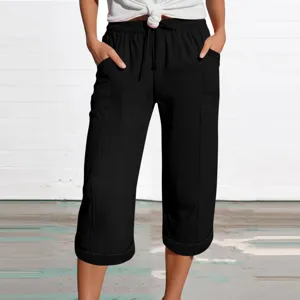 Casual linen cotton cropped pants for women, solid color loose capris with pockets.