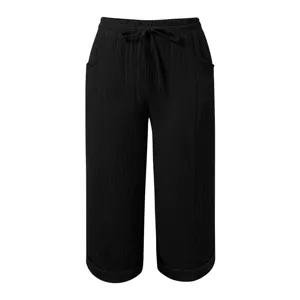 Detail shot of black casual cropped pants featuring an elastic waist and rolled cuffs.