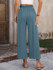 Detailed back view of casual solid color high waist loose wide leg pants for women.