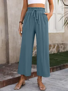 High waisted casual wide leg trousers detail, solid color linen texture, comfortable fit.