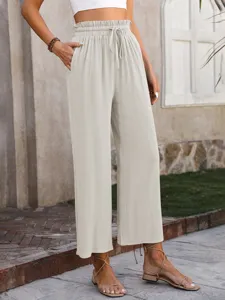 Casual solid color loose linen high waist wide leg pants detail view, comfy summer style.